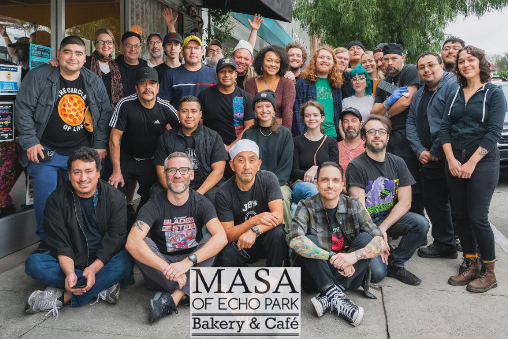 Masa family photo, outside the restaurant photographed in 2022